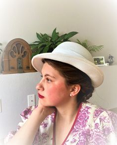 A truly stunning white sunhat, in perfect condition! This piece feels like the perfect summer accessory!  Although probably from the 1960s, this hat can very easily by worn and styled more 1910s 'Downton Abby' as well! Made with a breathable weave and decorated with a pleated sash, this hat truly speaks of garden parties, picnics and Sunday strolls!! White Panama Hat With Curved Brim, White Fitted Fedora Straw Hat, White Brimmed Fedora For Kentucky Derby, Classic White Fedora Sun Hat, White Fitted Panama Hat For Beach, Classic White Brimmed Hat, Fitted White Panama Hat For Beach, White Fedora Hat For Kentucky Derby, White Straw Hat With Curved Brim