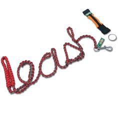 a red rope with the word love spelled out on it and a pair of pliers next to it