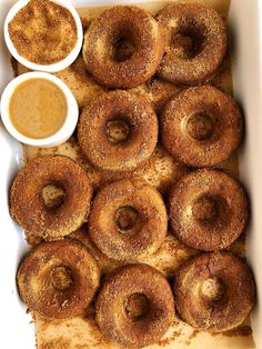 doughnuts and dipping sauce in a white dish