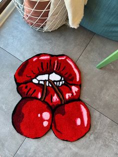 a red rug with the lips painted on it