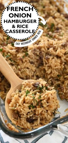 french onion hamburger and rice casserole in a glass dish with a wooden spoon