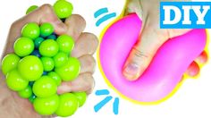 two hands holding green and pink balls with the words diy in front of them