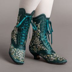 Indulge in a piece of history with Flora Embroidered Boots, an exclusive reproduction of the intricate opera and evening boots popular in the late Victorian period. Expertly crafted with intricate botanical detailing, these stunning satin boots will take you back to an era of sophistication and finesse. Wear them with bustle and Belle Epoque attire from the 1870s to c. 1900, or with modern dress as a statement piece. The Flora Boots are designed in collaboration with the Bata Shoe Museum. Every Satin Boots, Bata Shoes, American Duchess, Victorian Boots, Glamour Vintage, Oxford Pumps, Dr Shoes, Embroidered Boots, Oxford Boots