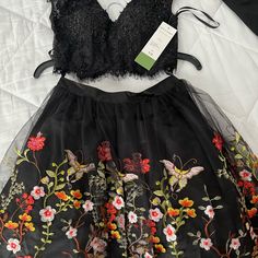 It’s Beautiful Dave And Johnny Is Black With Embroidered Floral On The Skirt Built-In Bra Beautiful Black Sequins On The Top The Skirt Is Floral With Butterflies Embroidered All Over It It’s Brand New Never Been Worn Tags Still Attached Selling Out Of Amazing Price Size 3-4 Chic Black Spring Sets, Chic Black Sets For Spring, Embroidered Sets For Spring Evening, Spring Party Sets With Floral Print, Embroidered Party Skirt For Spring, Evening Sets With Floral Embroidery For Spring, Spring Evening Sets With Floral Embroidery, Embroidered Party Sets For Fall, Fall Party Embroidered Sets