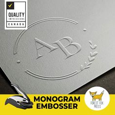 the monogram embosser has been designed to look like it is being cut