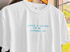 Embroidered "His grace is sufficient for me" Comfort Colors T-Shirt Looking for a comfortable and stylish way to express your faith? Look no further than our embroidered Comfort Colors t-shirt! With its soft fabric and eye-catching design, this shirt is the perfect way to show your love for God while staying cozy and cute. Featuring a beautiful Bible verse reference, it's sure to be a hit with believers of all ages. I embroidered text and graphic onto the Comfort Colors tee myself. The text is inspired directly by Scripture, from 2 Corinthians 12:9. "But he said to me, 'My grace is sufficient for you, for my power is made perfect in weakness.' Therefore I will boast all the more gladly of my weaknesses, so that the power of Christ may rest upon me." Color: White with blue thread Fit: Unise His Grace Is Sufficient, Aesthetic Bible Verse, Aesthetic Bible, Jesus Clothes, Embroidered Text, Bible Verse Gifts, Faith Clothing, Beautiful Bible Verses, Jesus Tshirts