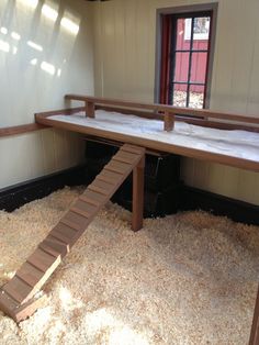 there is a bunk bed in the middle of a room with carpet on the floor