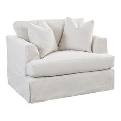 a white chair with pillows on it and a pillow in the back corner, against a white background