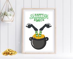 a st patrick's day poster hanging on a wall next to a pot of gold coins