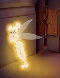 the tinkerbell fairy is sitting in front of an open door with its light on