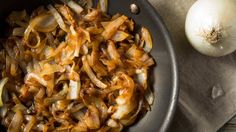 an onion and garlic dish in a skillet