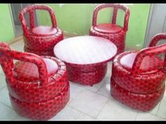 four red chairs and two round table on tiled floor