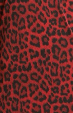 a red and black animal print dress