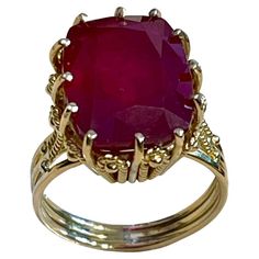 Formal Fine Jewelry Ruby Ring With 17 Jewels, Vintage Gia Certified Ruby Ring For Formal Occasions, Formal Gia Certified 14k Gold Ruby Ring, Exquisite Yellow Gold Ruby Ring For Formal Events, Formal Cabochon Ruby Ring, Luxury Hallmarked Ruby Ring For Formal Occasions, Heirloom Ruby Ring With Diamond Cut For Formal, Classic Collectible Ruby Ring, Formal Yellow Gold Ruby Ring