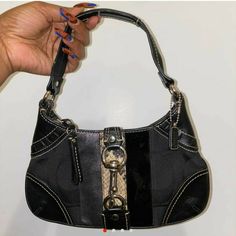 Beautiful Black Vintage 2000s Coach Leather Mini Shoulder Demi Bag. Iconic Style!!! Patchwork Detail. Perfectly Fits Under The Shoulder And Holds So Much. 9.5/10 Condition! Basically Perfect Besides A Few Little Marks On Bottom. Great Vintage Condition Especially For Like 15-20 Years Coach Black Shoulder Bag With Metal Hardware, Vintage Black Coach Bag, Black Coach Shoulder Bag With Snap Closure, Coach Black Hobo Bag With Gold-tone Hardware, Brown/black Coach Bag, Vintage Coach Bag, Vintage Coach Bags, Vintage 2000s, Bags Vintage