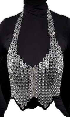 a black top with silver chains on it