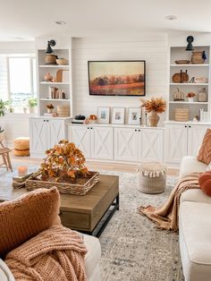 a living room filled with furniture and decor