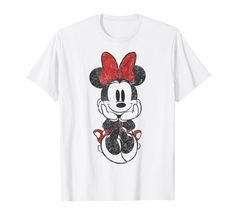 a mickey mouse t - shirt with a red bow on it's head and the word