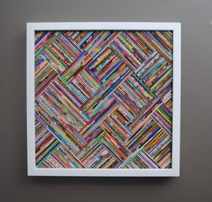 a white frame with multicolored lines on it