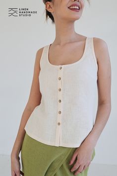 Linen tank top Bria. Features: • sleeveless open-neck style • button-down closure • shirt length is 21.5 inches (55 cm) • handmade at a small studio in Europe Casual Camisole With Wide Straps, Spring Cotton Tank Top With Wide Straps, Beige Cotton Sleeveless Tank Top, Casual Cotton Tank Top With Wide Straps, Beige Sleeveless Cotton Tank Top, Spring Tank Top, Spring Mesh Tank Top, Beige Cami Vest Top, Everyday Sleeveless Cotton Tops