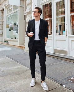 Wearing a black suit with a white crew neck t-shirt and grey canvas sneakers. Black And White Outfit For Men, White Outfit For Men, Winter Mode Outfits, Formal Men Outfit, Black White Outfit, Hipster Man, Mens Fashion Urban