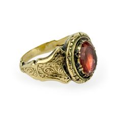 "This charming late Georgian or early Victorian ring centers on faceted foil backed rock crystal. Hand fabricated in 10k gold with delicate chased details. Currently a size 4.5 Measurements: 1/2\" north to south Weight: 2.7 grams Condition notes: one tiny chip and minor wear to the facets, some discoloration and crazing to the foil, no restorations. Care should be given to not to immerse in water." Antique 14k Gold Moonstone Ring Gift, Antique 14k Stamped Jewelry For Ceremonial Occasions, Antique 14k Gold Moonstone Wedding Ring, Heirloom Gold Signet Ring With Gemstone, Heirloom Faceted Gold Jewelry, Antique Ceremonial Ring Jewelry, Heirloom Gold Ruby Ring With Rose Cut Diamonds, Heirloom Ruby Ring With Rose Cut Diamonds In Gold, 14k Gold Oval Jewelry For Ceremonial Occasions