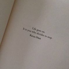 an open book with the words life goes on it is you who decides to stop