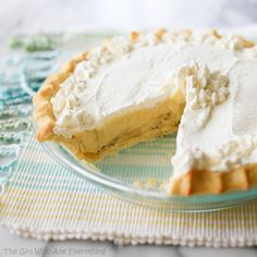 there is a pie on the plate with one slice cut out and ready to be eaten