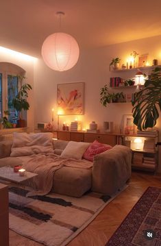 a living room filled with furniture and lights