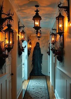 a hallway decorated with halloween decorations and lights