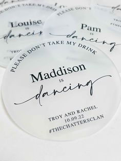 personalized wedding coasters with the names and date printed on them