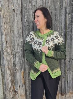 Hand knitted Lettlopi cardigan.  Primary colour - 1407 pine green Green Knitted Winter Cardigan, Winter Green Knitted Cardigan, Green Knitted Cozy Cardigan, Cozy Green Knitted Cardigan, Green Knitted Cardigan For Fall, Green Knitted Sweater Coat For Winter, Cozy Green Knitted Outerwear, Green Long Sleeve Sweater With Fair Isle Pattern, Green Fair Isle Sweater For Fall