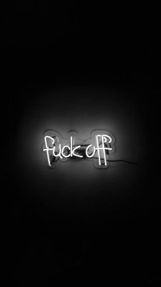 a neon sign that says flick off on the side of a black wall with white letters