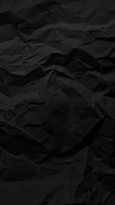 the black paper is wrinkled over and has been folded