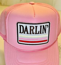 Pink "Darlin" Patch trucker hat. Adult, adjustable back. Hat Bar, Custom Trucker Hats, Trucker Hats, Trucker Cap, Caps Hats, Trucker Hat, Accessories Hats, Bathing Beauties, Ships