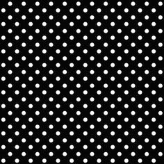 a black and white polka dot background