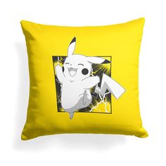 a yellow pillow with an image of a pikachu in the center and lightning behind it