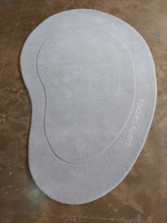 an oval shaped rug with the words, sweet baby feet on it's side