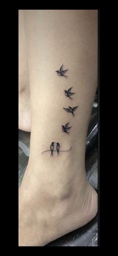 three birds on a wire tattoo on the ankle