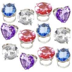 PRICES MAY VARY. GLITZY GOODNESS: Treat those little darlings to a serving of bling! These 1” rings for kids come in an eye-catching assortment of colored plastic jewels with a diamond-like sparkle. Every set includes 12 rings with an adjustable band that fits most kids’ finger. AWESOME COLOR ASSORTMENT: The variety of colors is what really makes these rings a cut above the rest. Every set includes an eye-catching assortment of blue, pink, purple, and clear; perfect for adding pizazz to any outf Cute Party Ring Jewelry, Plastic Wedding Rings, Princess Rings, Kids Carnival, Colors Dress, Princess Ring, Plastic Ring, Rings Set, Playing Dress Up