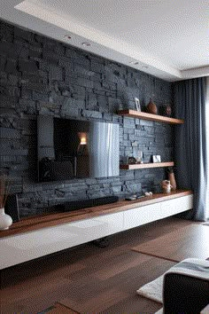 a modern living room with stone wall and wooden flooring, built in entertainment center