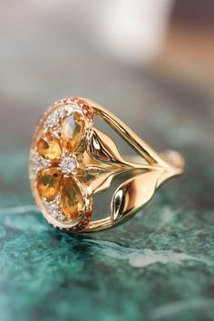 Orange slice ring with citrine, diamonds and sapphires | Eden Garden Jewelry™ Gold Fruit, Statement Engagement Ring, Nature Inspired Engagement Ring, Orange Slice, Orange Fruit, Orange Sapphire, Custom Ring Designs, Deco Engagement Ring, Clothes Outfits