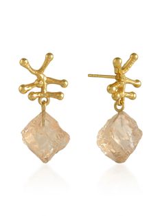 RAW STYLE WHAT IT IS: Raw Crystal Drop Earrings Hang from a gold plated spike design WHY IT’S SPECIAL: The perfect mix of organic and polished A lightweight, natural look GOOD TO KNOW: Dimension: Length 3.8 cm / 1.6 inch Metal is 22 carat gold plated on silver Stones are raw crystal Also available in clear WHY WE LOVE SHYLA: This London brand delivers clean, minimalist and contemporary jewelry that packs a punch. Using only natural stones and ethically sourced or recycled metals, thoughtful prod Raw Crystal Earrings, Raw Stone Earring, London Brands, Crystal Champagne, 22 Carat Gold, Spring Makeup, Body Makeup, Natural Forms, Crystal Drop Earrings