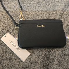 Nwt Calvin Klein Black Wristlet, Faux Leather, Black Interior, Gold Hardware Measures 7 In X 4.5 In Bundle W Other Listings For The Best Deal! Pay One Shipping Fee And Buy Multiple Items From My Closet In One Transaction. Reasonable Offers Always Welcome! Calvin Klein Bags, Black Wristlet, Calvin Klein Black, Best Deal, Black Interior, Womens Calvin Klein, Gold Hardware, Calvin Klein, Faux Leather