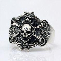 Biker skull ring made of solid 925 silver, a great gift for boyfriend. Visit our website for more men's rings and men's bracelets featuring skulls. #skullring #bikerring #mensring #silverring Indigo Jewelry, Pirate Ring, Skull Pirate, Pirate Jewelry, Mens Silver Jewelry, Unique Silver Jewelry, Biker Jewelry, Pirate Skull, Silver Dragon