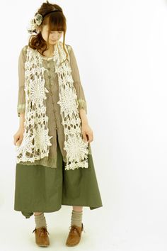 I like the big doily, super open lacework scarf as accent.