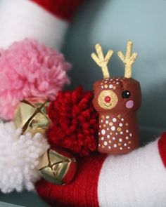 a close up of some christmas decorations on a shelf