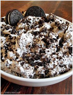 oreo cookies and cream dessert in a white bowl