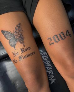 two people with tattoos on their legs, one has a butterfly and the other has flowers