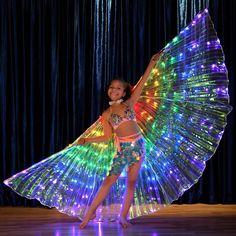 PRICES MAY VARY. For: The LED butterfly wing is for Halloween costume, belly dance, carnival, music rave or any event you might be attending. Amazing Effect: Our glowing LED wing is an illuminating way to light up your body in the crowds, gorgeous at night, You are going to shine brightly for Halloween. Kids Gift Idea: The Light up wings made your kids more visible in the dark, which will give you a lot of peace of mind about their safety. Size: Kids Length 40 Inches, adult size 55 inches, pleas Led Butterfly, Rainbow Wings, Kids Dancewear, Dance Props, Butterfly Costume, Led Dance, Fest Outfits, Carnival Festival, Wings Costume